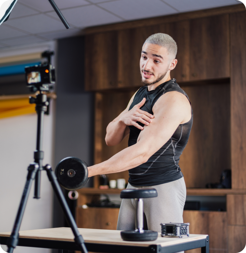 Blond guy with arm muscle shows his arm